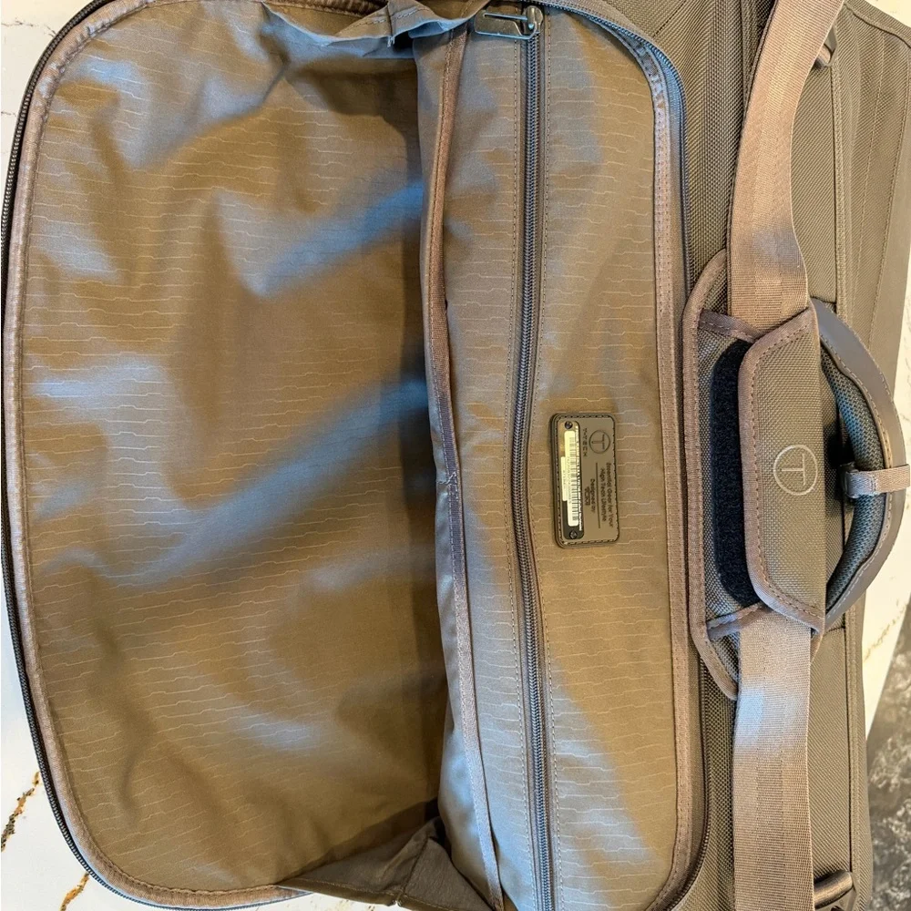 Tumi Brown Backpack with Multiple Compartments